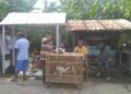 Pedagang mengolah ayam kampung untuk dijual